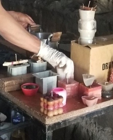 Candle-making training in progress